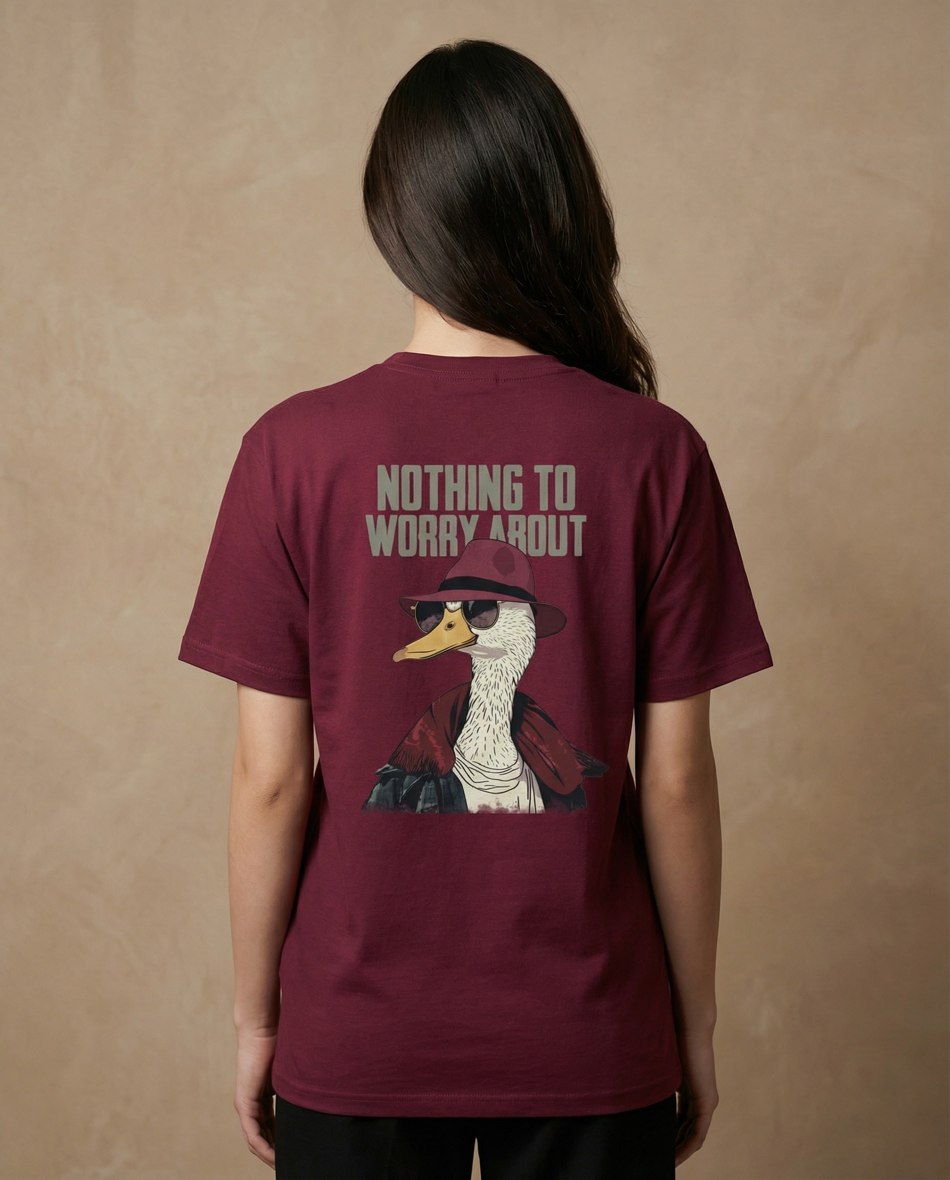Unisex graphic T-shirt by aurulu featuring the "Nothing To Worry About" print on soft cotton fabric.