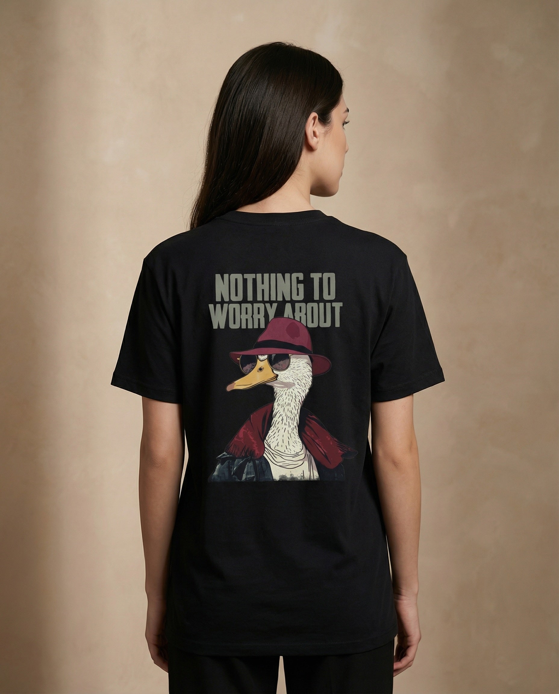 Unisex graphic tee by aurulu featuring a printed "Nothing To Worry About" design on soft fabric.
