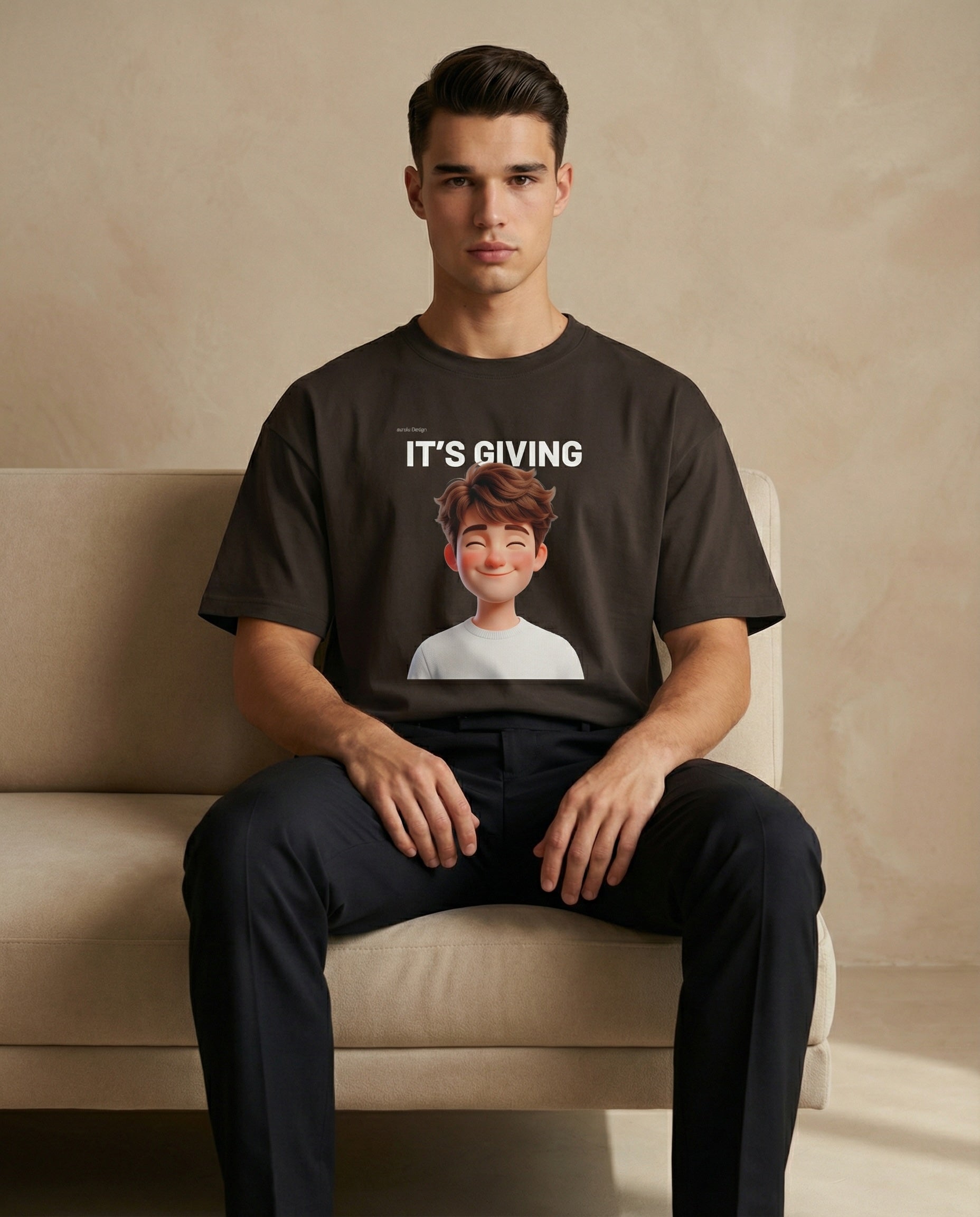 Oversized "It’s Giving" print tee from aurulu's Main Character Collection for men, featuring bold graphic design on soft fabric.