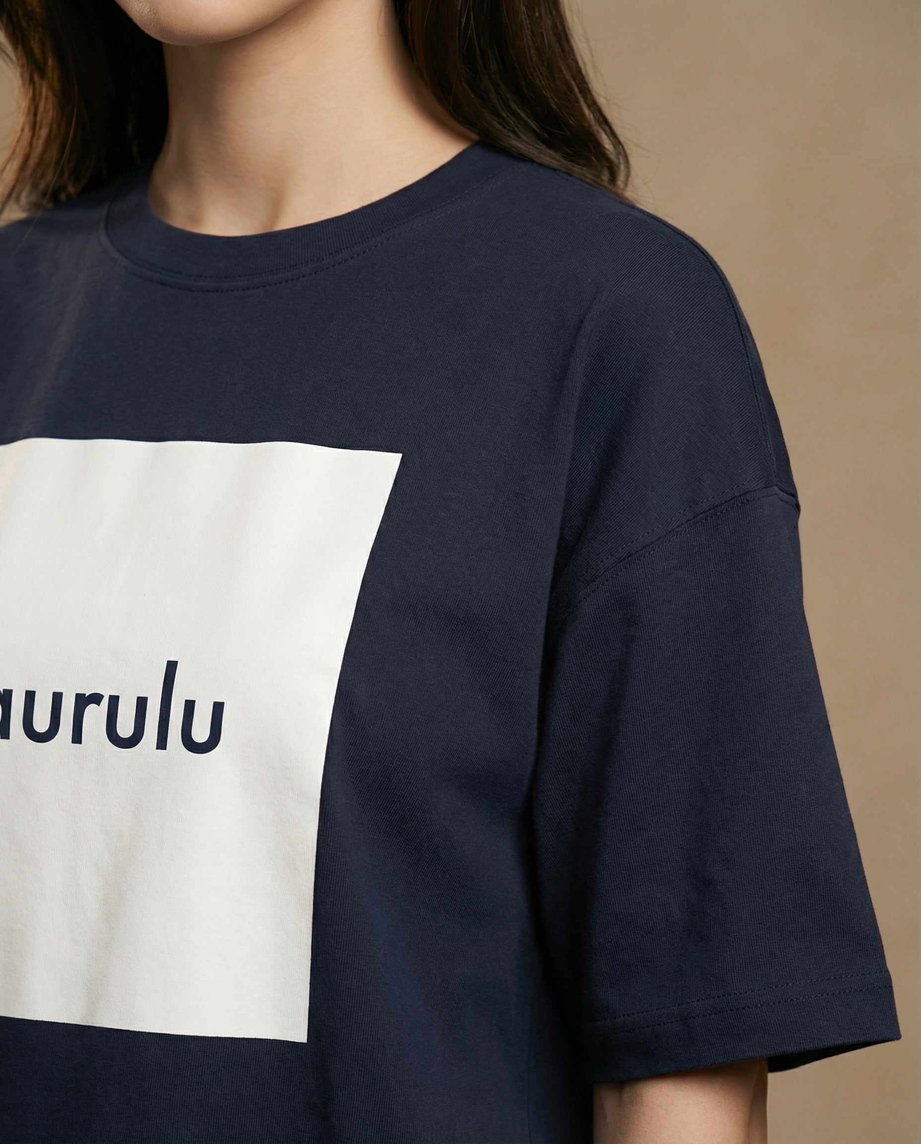 Aurulu women's oversized print T-shirt made from soft material, featuring a relaxed fit and stylish design.