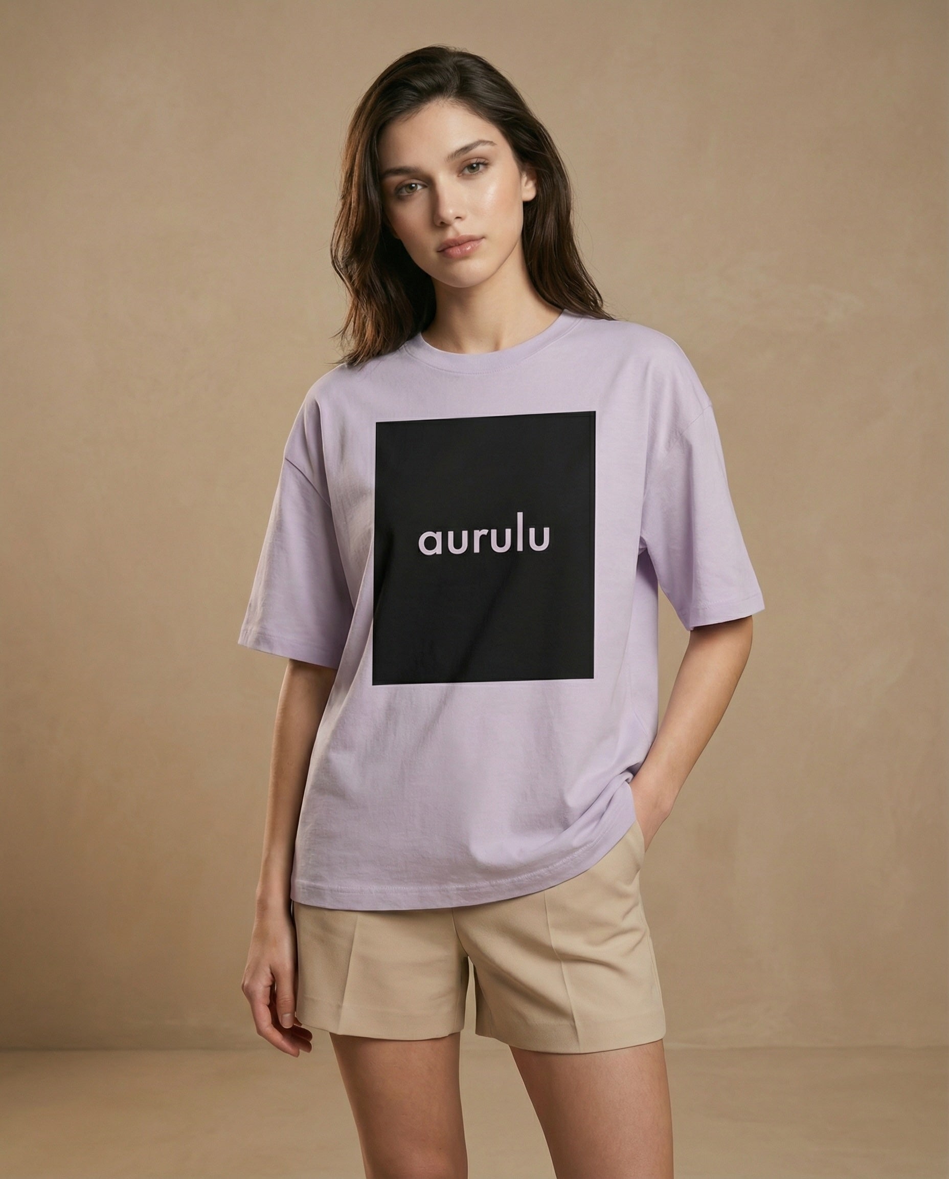 Aurulu women's oversized T-shirt with colorful print, relaxed fit, and soft fabric, perfect for casual wear.