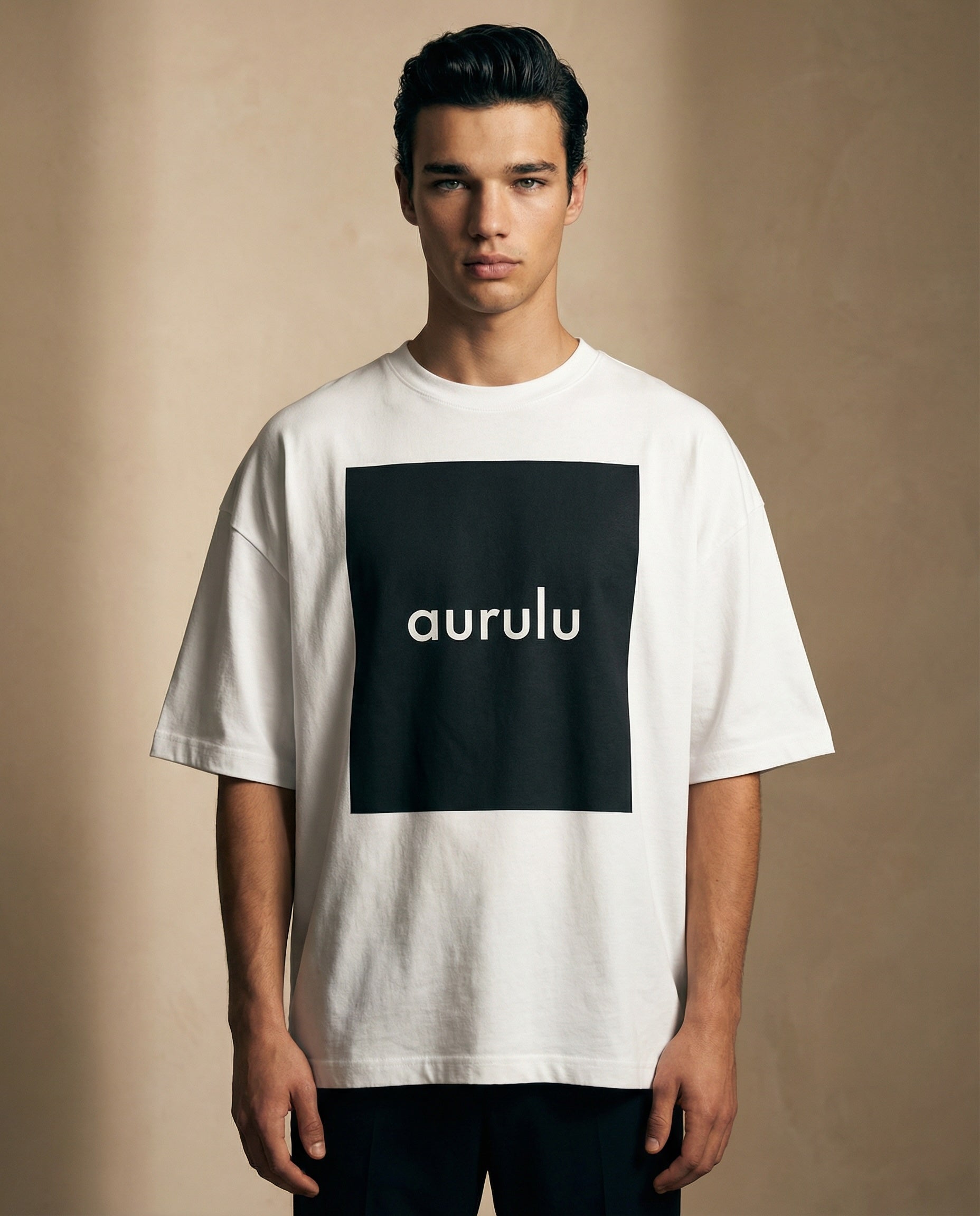 Aurulu man's oversized print T-shirt featuring bold graphic design, made from comfortable fabric, casual streetwear style.