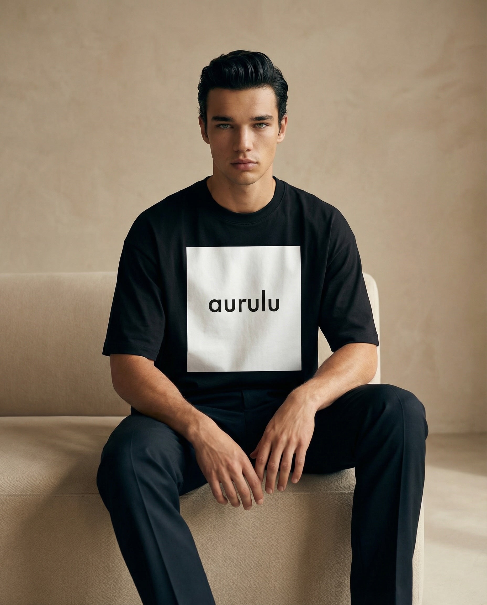 Aurulu men's oversized T-shirt with vibrant print design, made from soft material, displayed on a hanger.