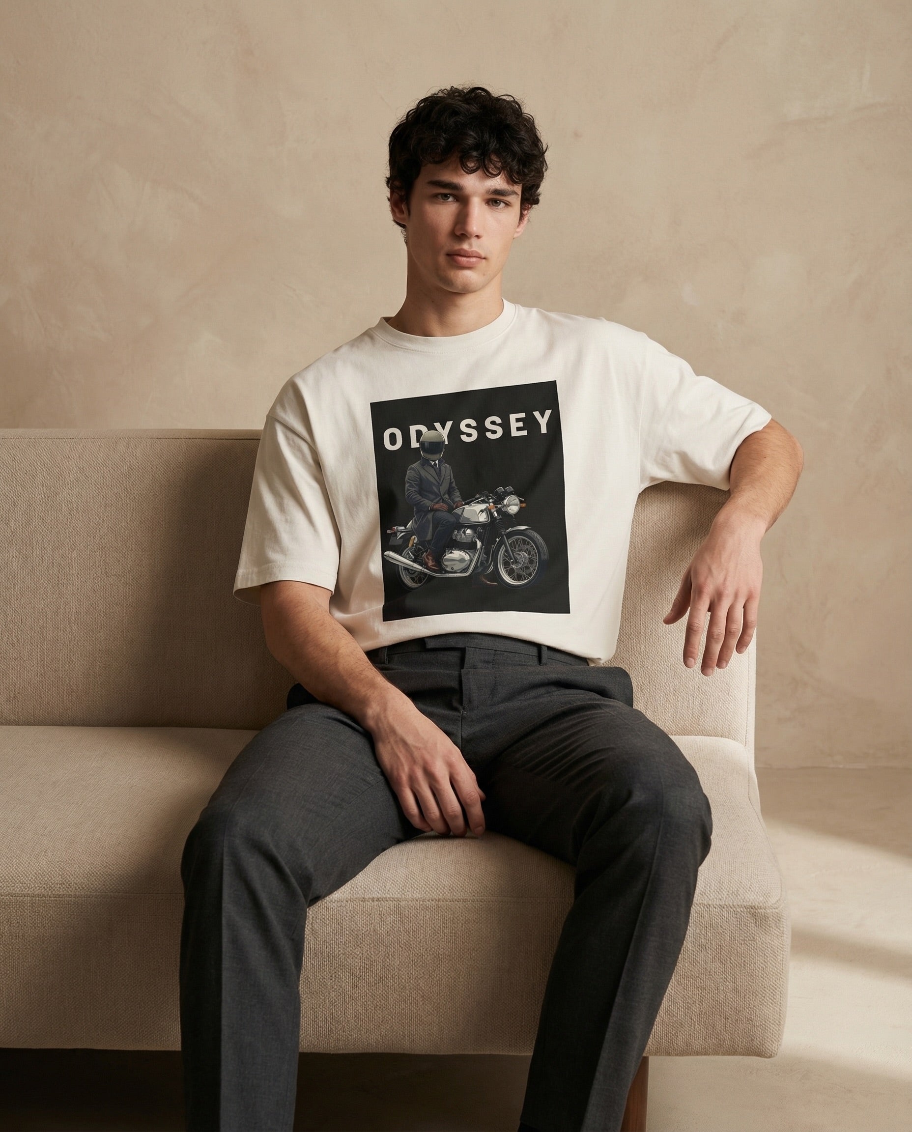 Aurulu ODYSSEY oversized men's T-shirt with bold print, casual fit, made from comfortable material, shown in a relaxed pose.