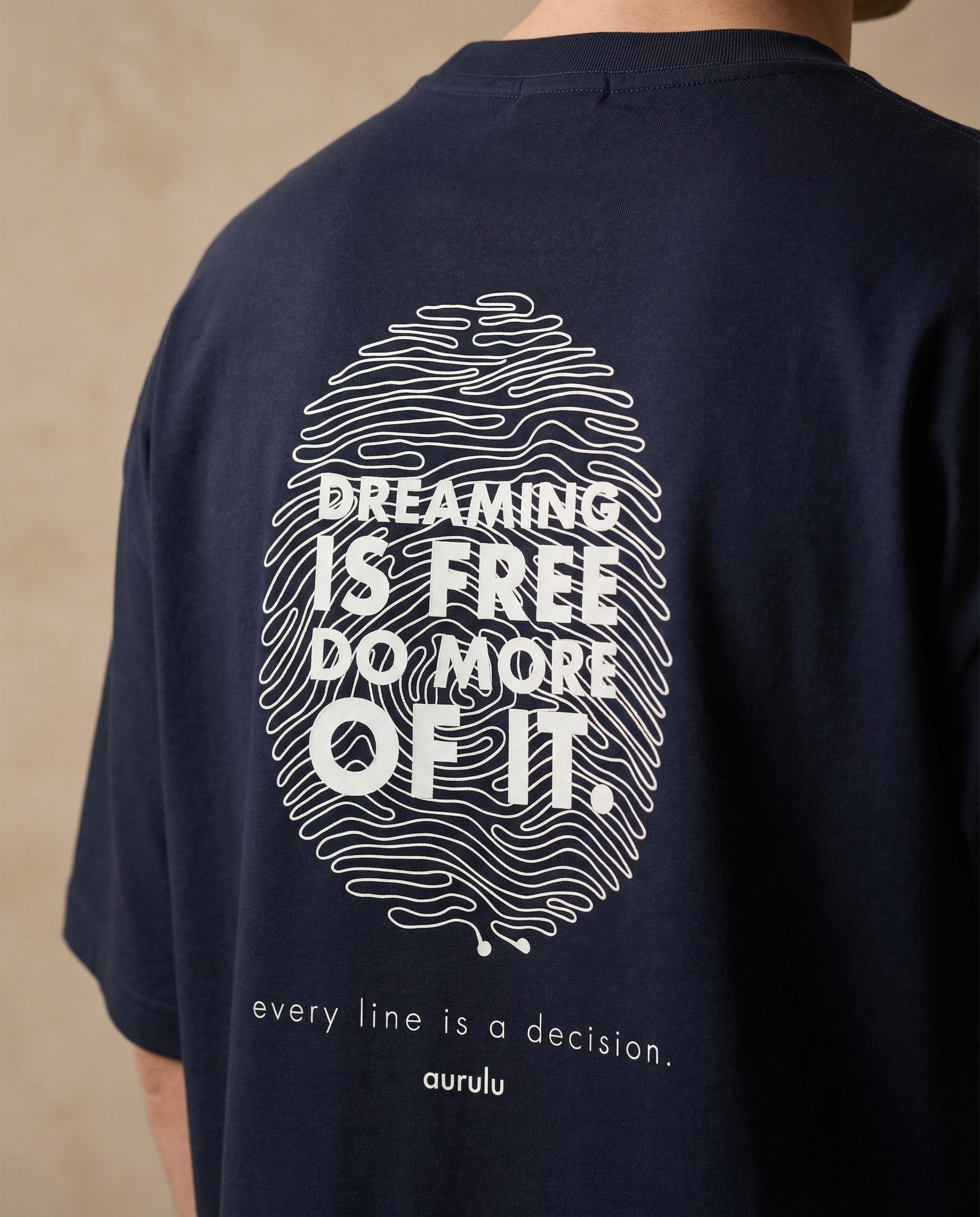 Aurulu men's oversized print tee made from soft material, featuring a relaxed fit and bold graphic design.