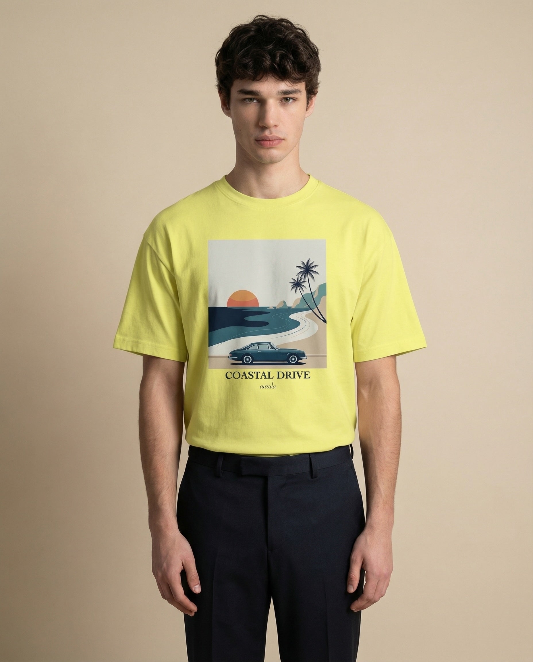 Aurulu Coastal Drive oversized men's print tee shirt featuring a colorful coastal scene on soft fabric.