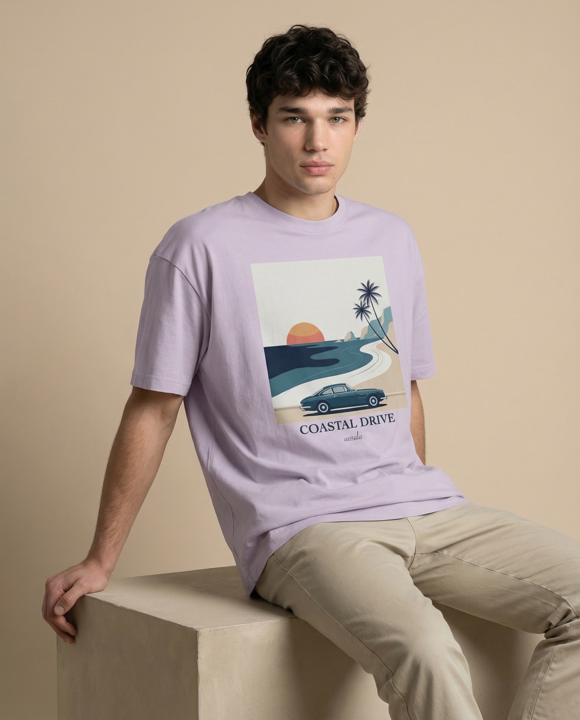 Aurulu Coastal Drive oversized men's print tee featuring a vibrant coastal-themed design on soft fabric.