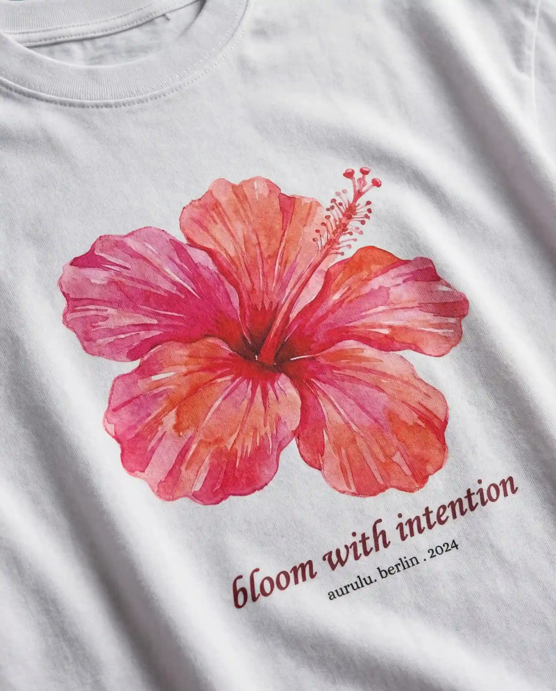 Aurulu Bloom With Intention women's oversized printed tee featuring floral design and relaxed fit.