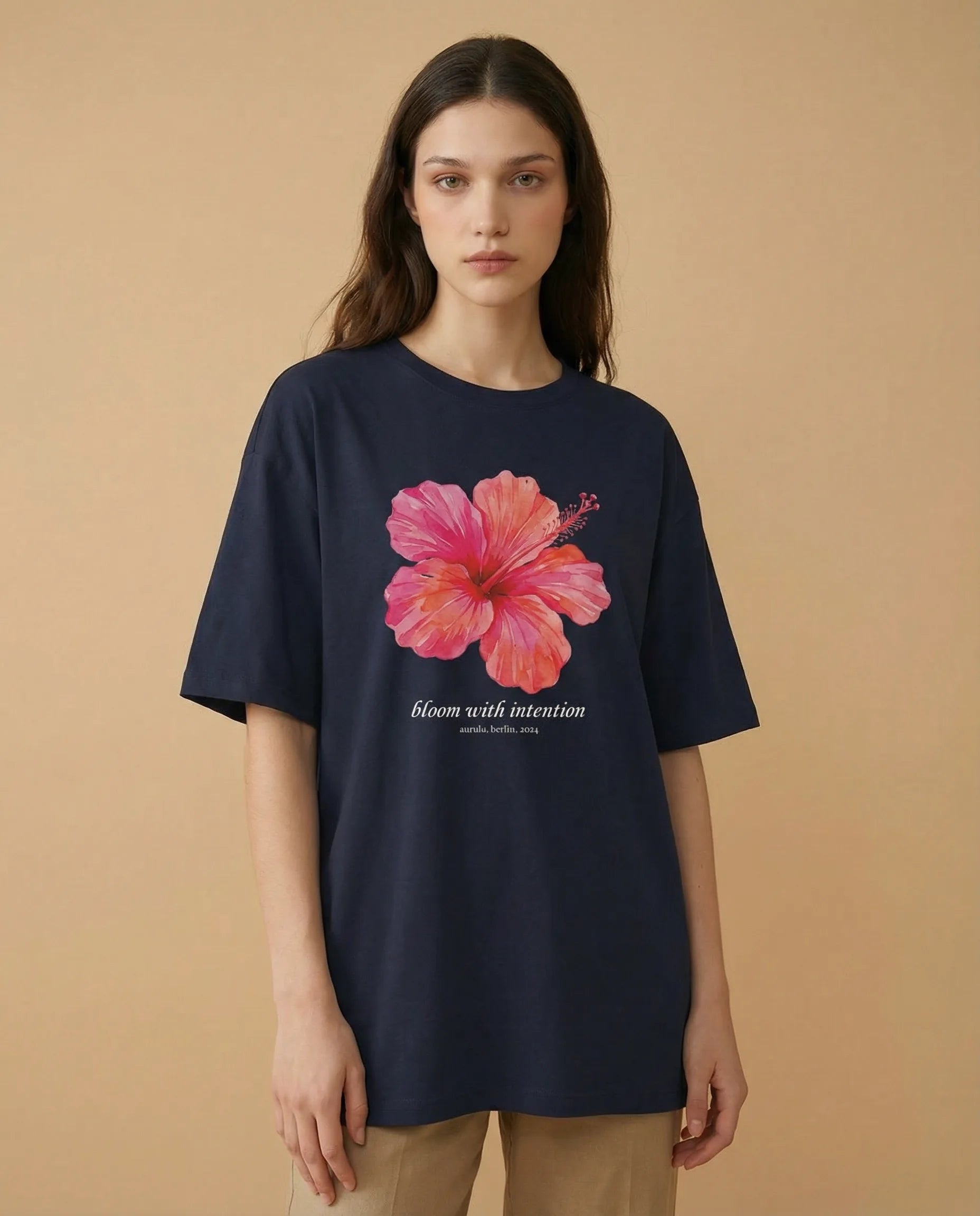 Aurulu Bloom With Intention women's oversized print tee featuring a floral-inspired design on soft fabric.