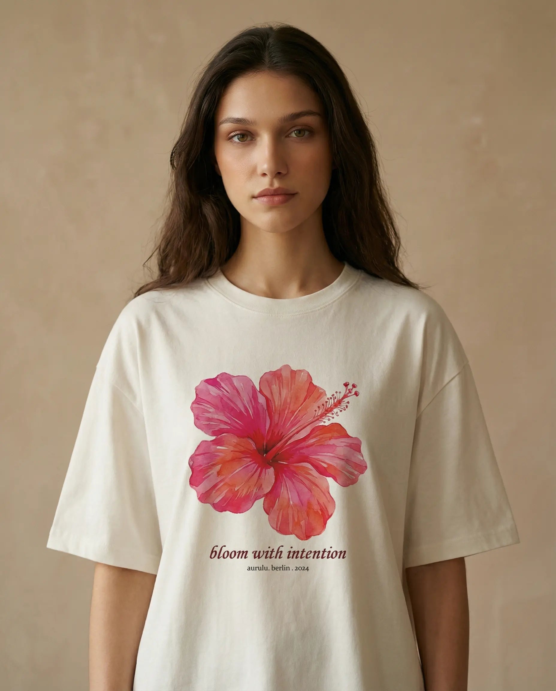 Oversized women's tee with floral print design from aurulu's Bloom With Intention collection, showcasing a relaxed fit and vibrant artwork.