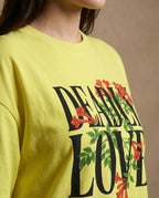 Deadly Love women's oversized T-shirt with bold print design from aurulu, shown in a close-up image featuring the graphic detail.