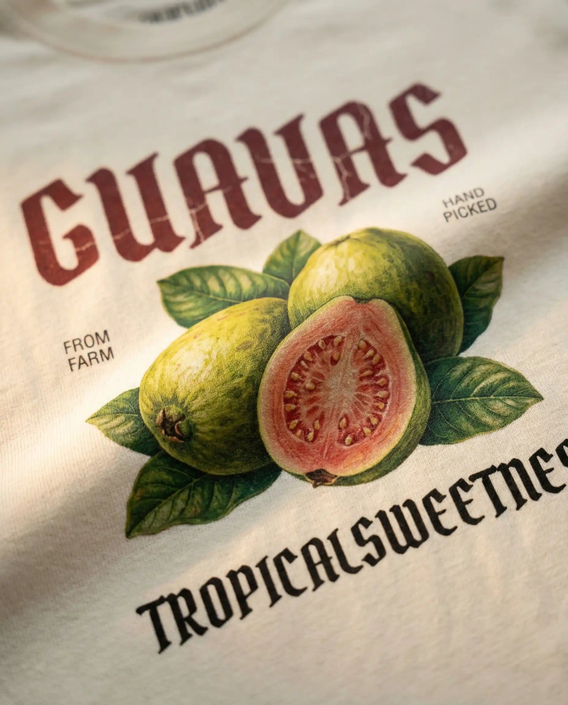 Guavas Women's Tee with tropical print, featuring vibrant guava illustrations on soft fabric, by aurulu.