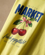 Aurulu Mitte Market women's oversized print tee featuring a colorful graphic design on soft fabric.
