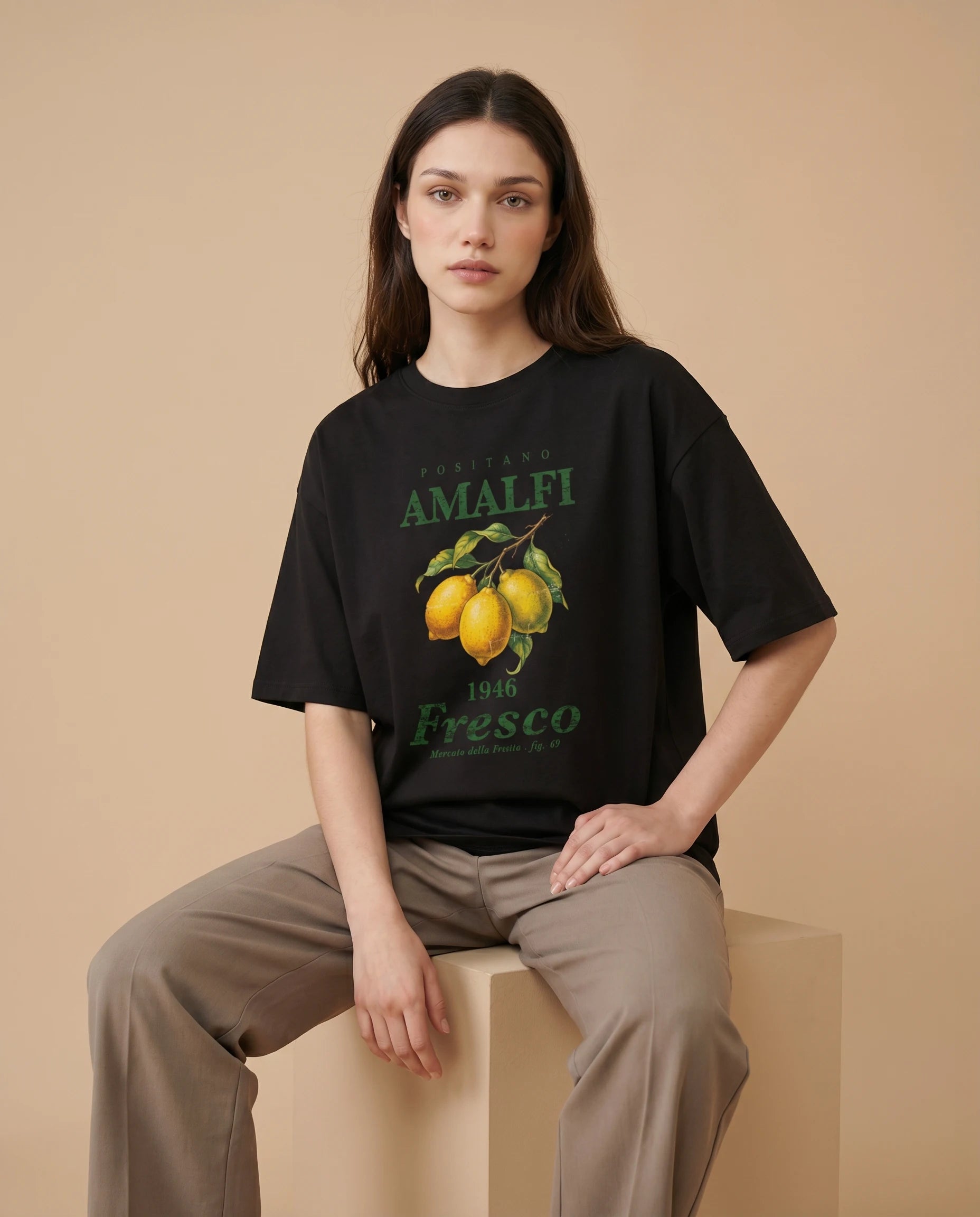 Amalfi Fresco women's oversized tee by aurulu featuring a colorful print inspired by Positano and Amalfi coast scenery.