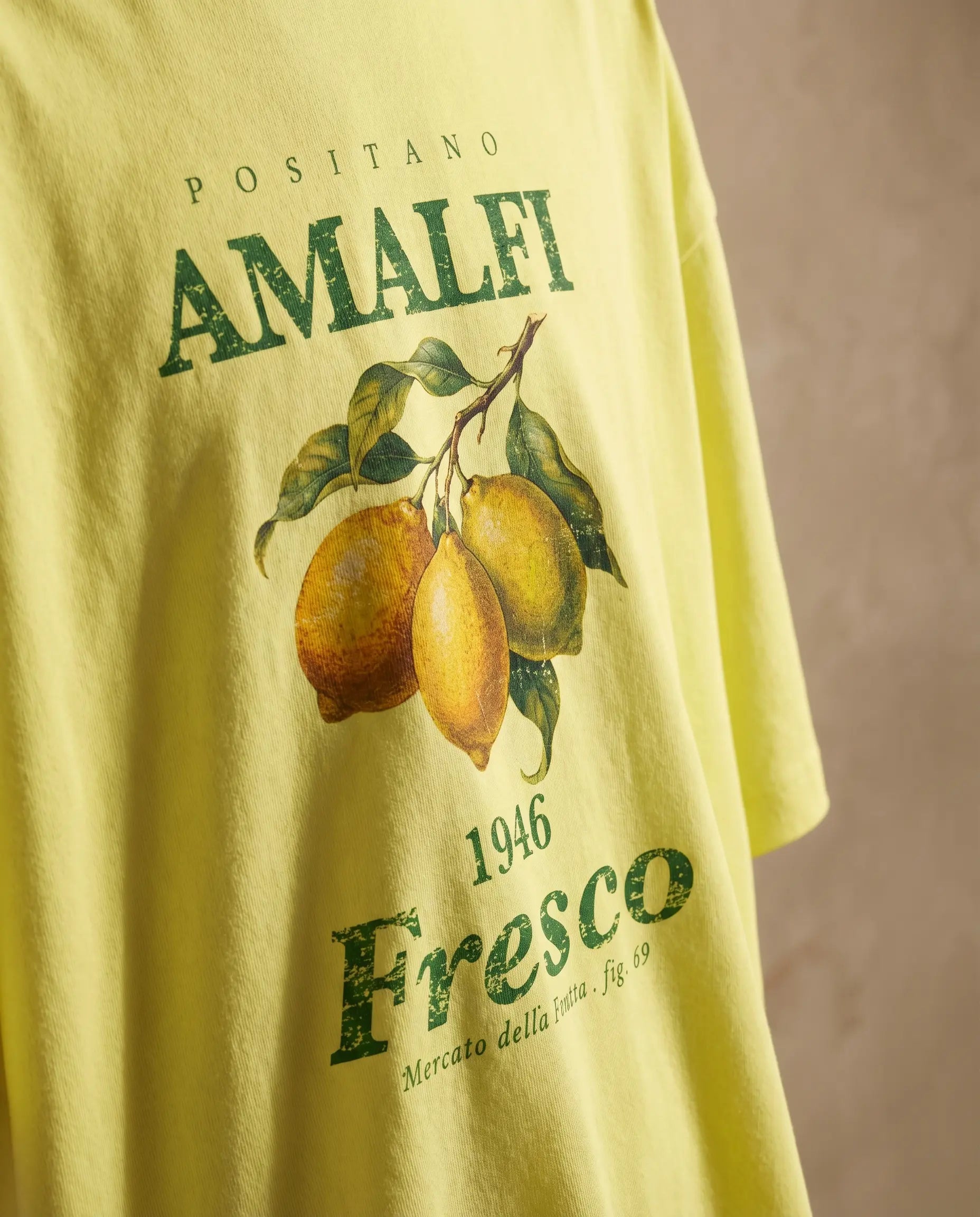 Amalfi Fresco women's oversized tee by Aurulu featuring a colorful print inspired by Positano and Amalfi coast scenery.