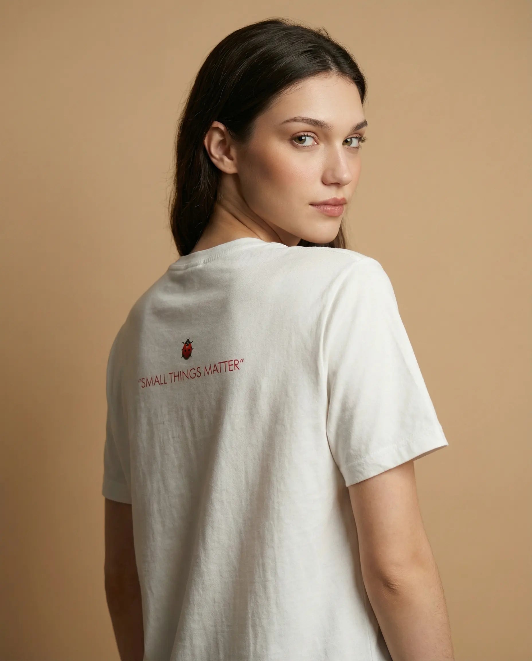 Women's print tee by aurulu with "Small Things Matter" design, casual short-sleeve shirt in soft fabric.