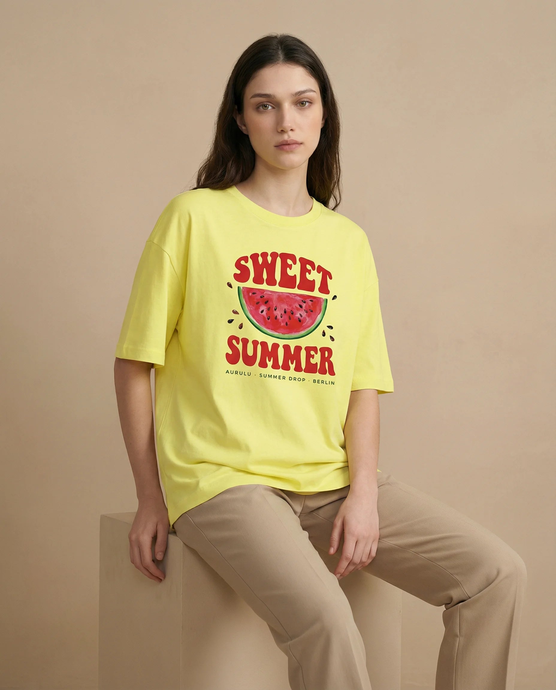 Sweet Summer Women's oversized print tee by Aurulu, featuring a colorful, relaxed-fit design on soft cotton fabric.
