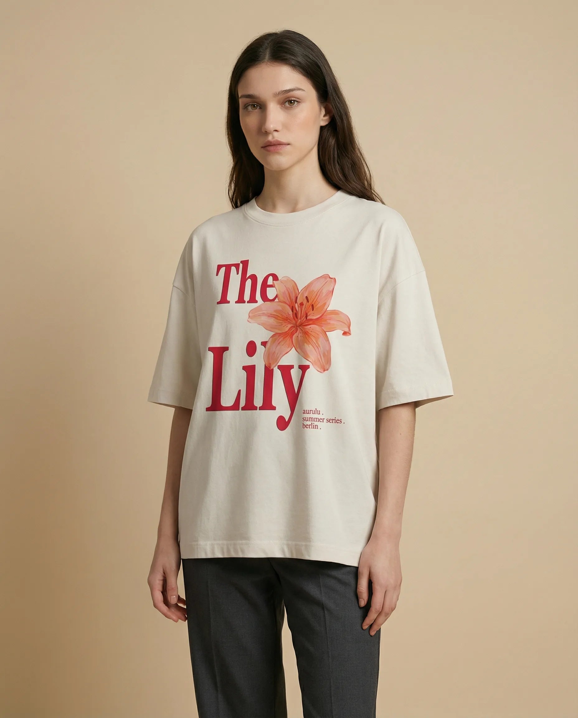 Oversized women's print tee from aurulu's The Lily collection, featuring a relaxed fit and vibrant graphic design.