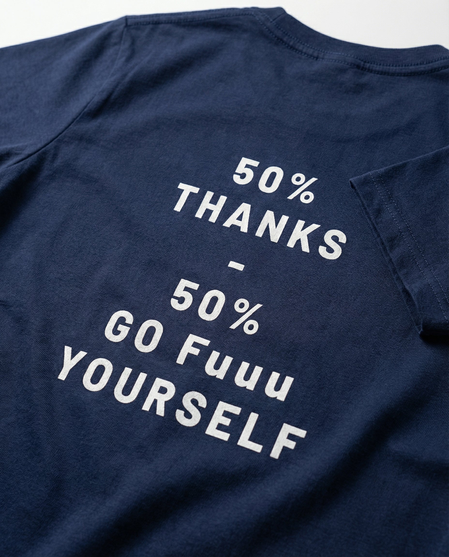 Women’s 50% Thanks Duality Statement Tee by aurulu, featuring a printed design on soft fabric, shown in a close-up view.