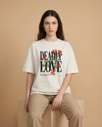 Deadly Love Women's oversized print tee by aurulu, featuring bold graphic design on soft fabric, displayed on a hanger.