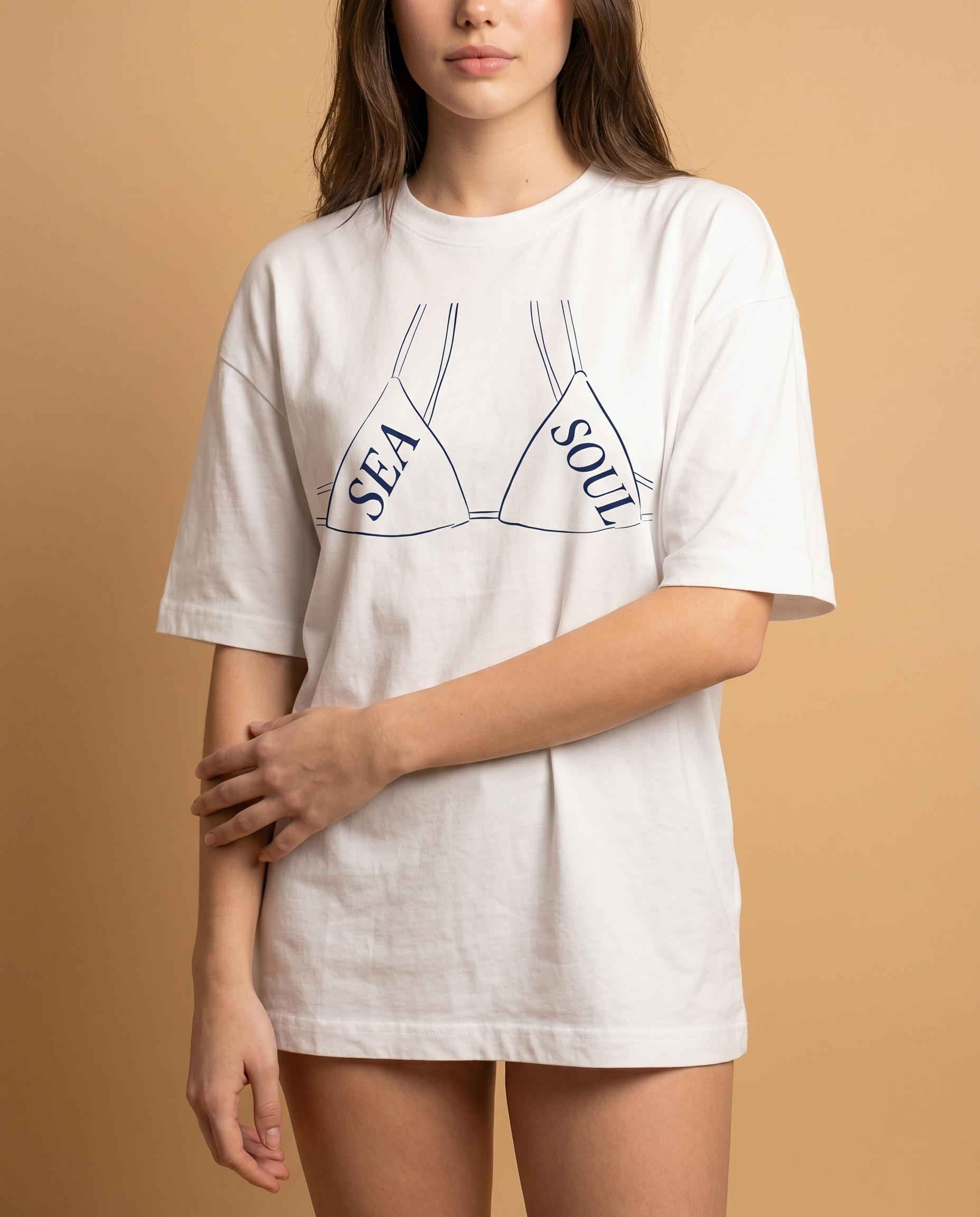 Sea Soul women's oversized tee with vibrant print, made from soft material by aurulu, displayed flat in the image.