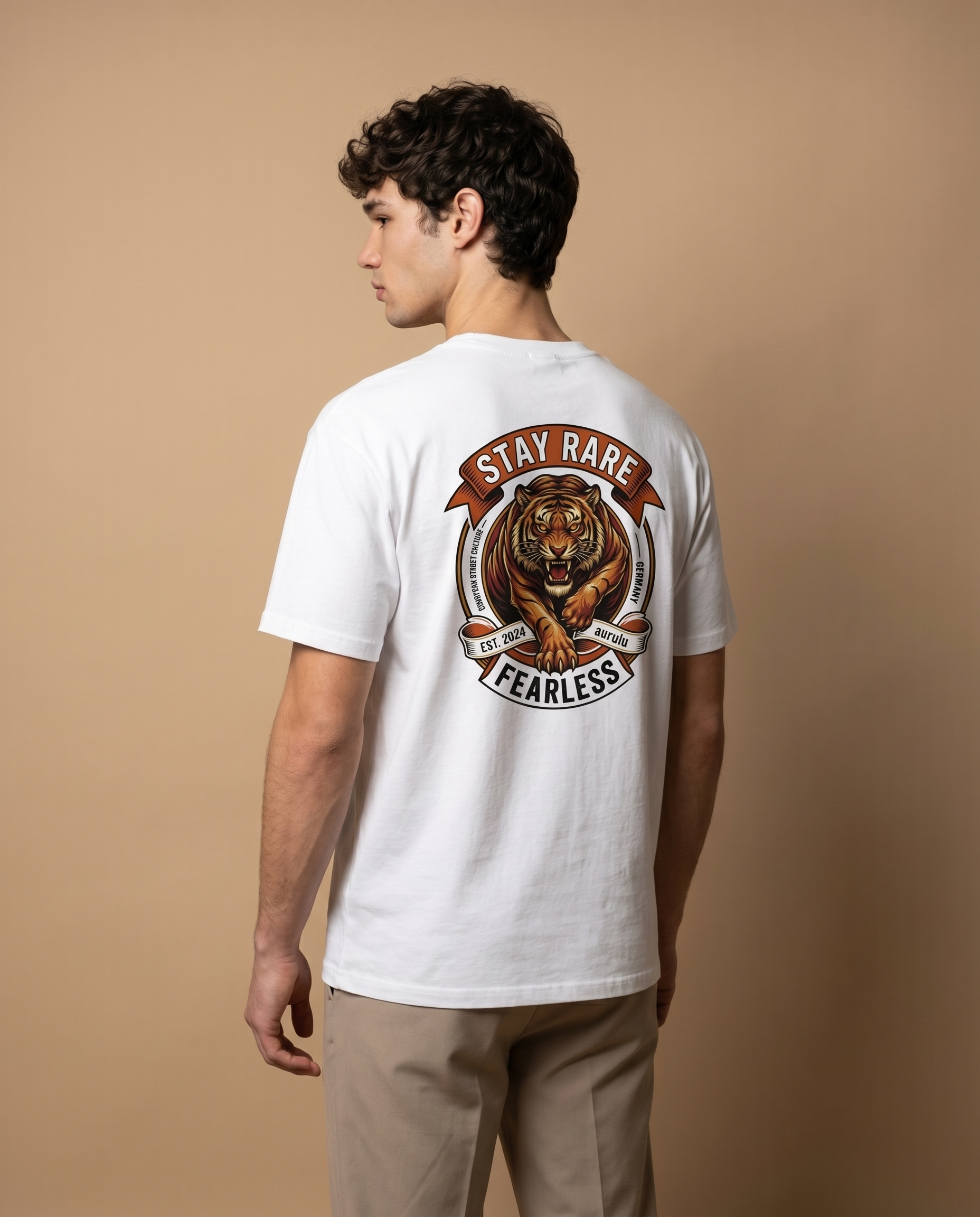 Unisex crewneck tee by aurulu featuring a bold print design with "Stay Rare Fearless" text on soft fabric.